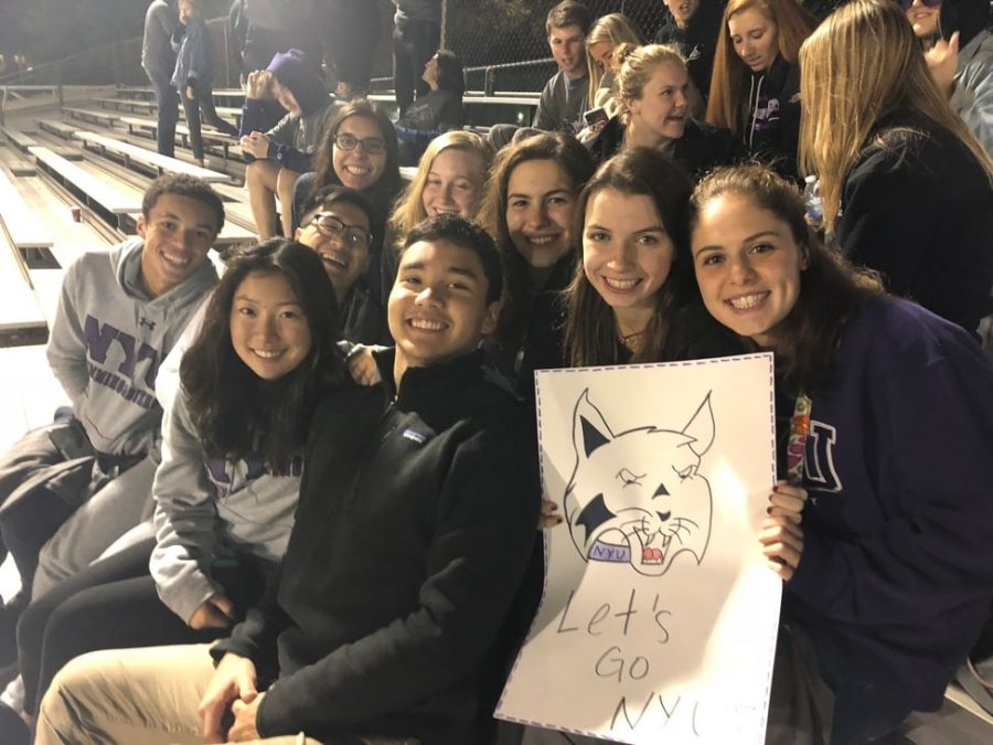 NYU students support the men's and women's soccer teams at a doubleheader on Oct. 12. (Photo by Belle Lu)