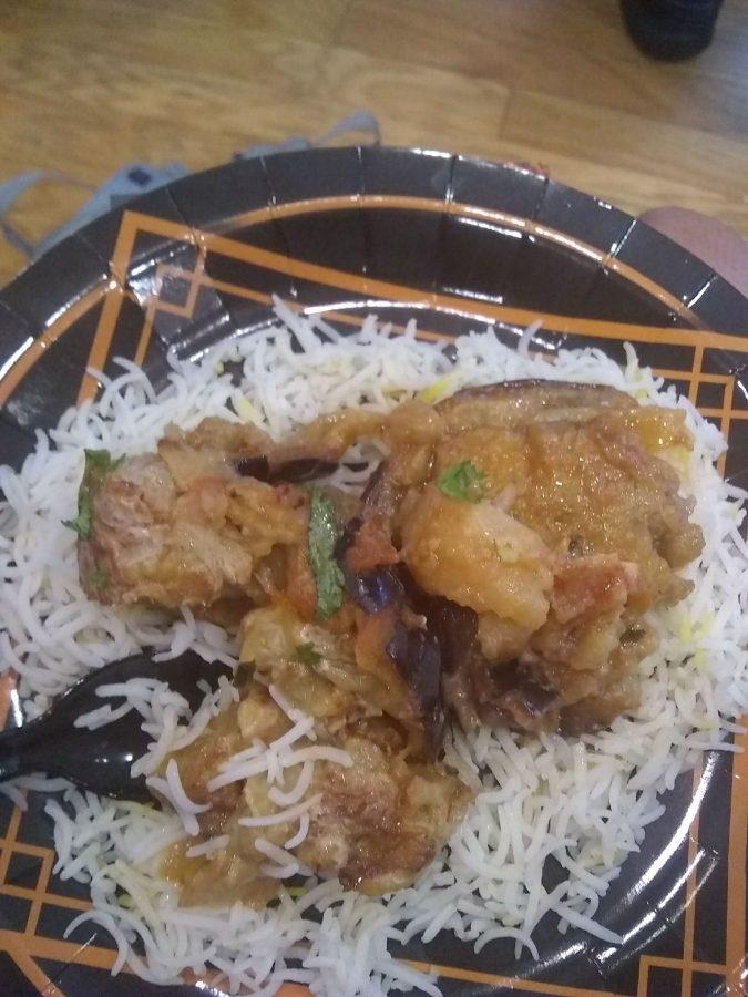 Chef Bashir cooked saffron rice and dish made of potatoes, tomatoes and eggplant. (Photo by Alexandria Johnson)