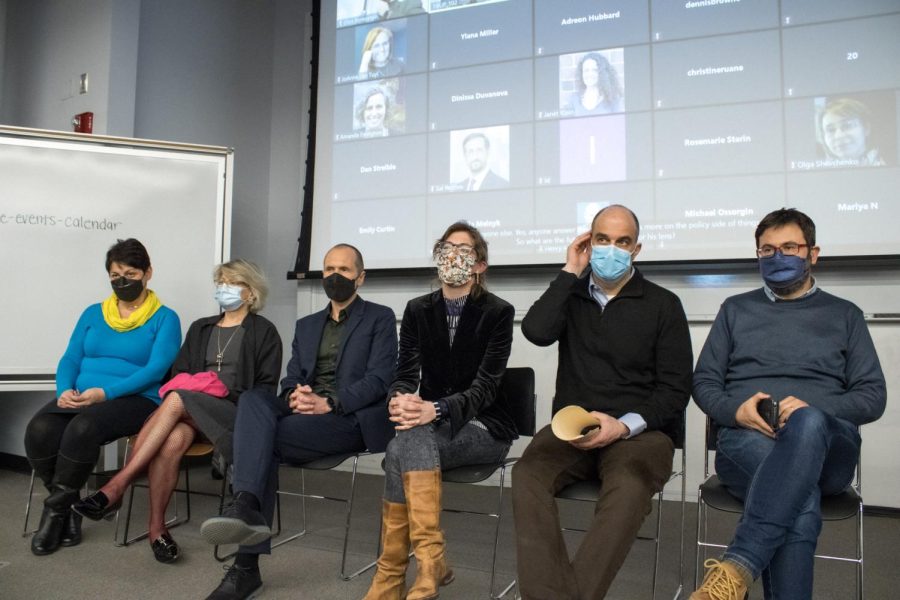 Seven professors sit in chairs at the front of the classroom. From left to right: Natalia Levina, Anne Lounsbery, Arturas Rozenas, Annie O'Donnell, Joshua Tucker and Rossen Djagalov.
