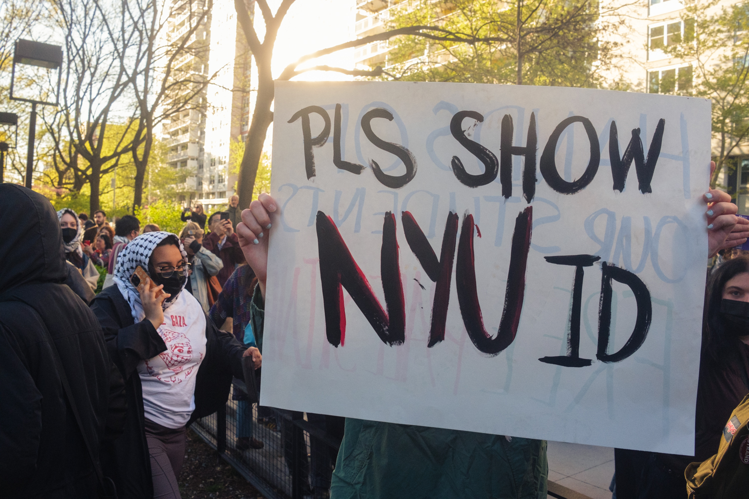 IDEA3265 A sign that reads “Please Show N.Y.U. I.D.”